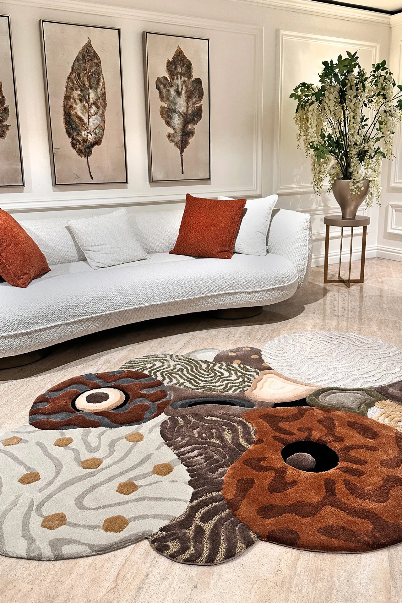 Modern living room with an abstract multicolored carpet on beige floor 
